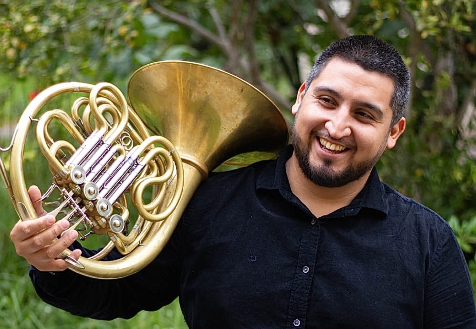 Angelo Vidal Vargas, cornista OSULS, presentará alegre concierto solista de Mozart con motivos de la Semana de la Educación Artística